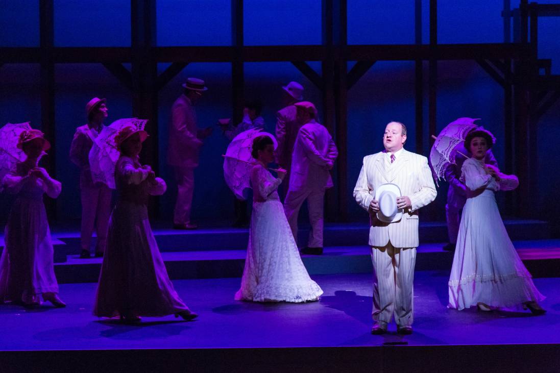 David Kincannon as Father in a spotlight as he delivers his portion of the prologue.